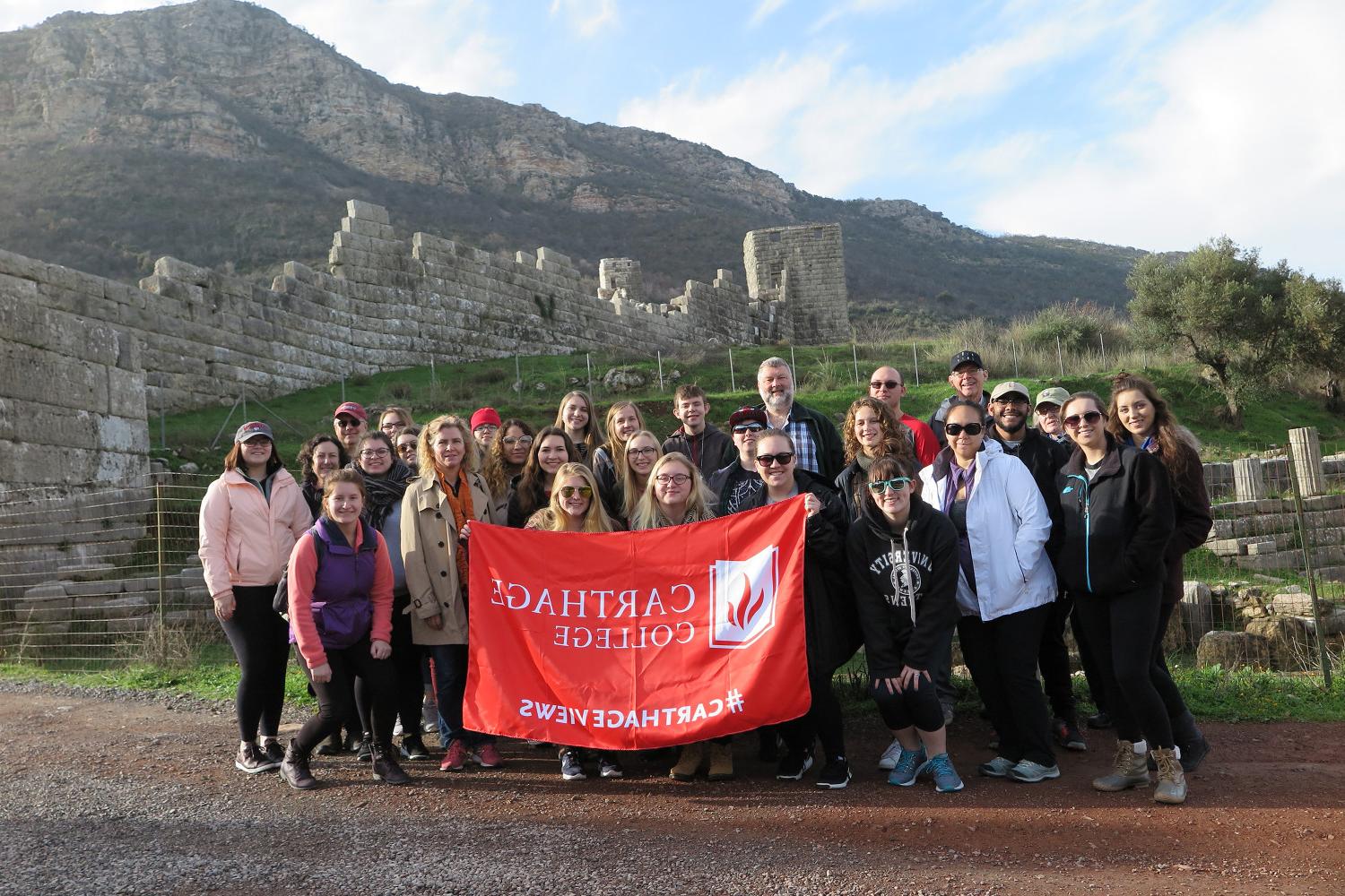 Students carry the Carthage flag in Greece.